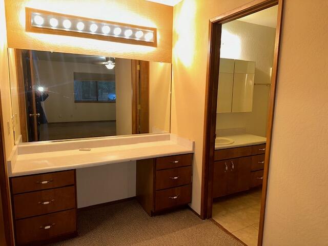 7722 Hidden Meadows Road Shingletown, CA 96088 - Photo 10 of 12 a bathroom with a sink and a mirror