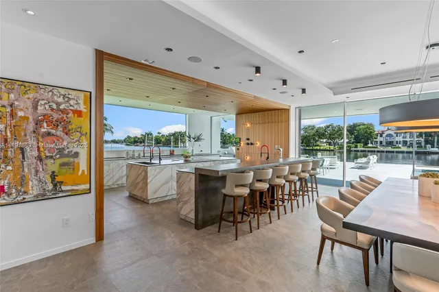 a kitchen that has a sink and a stove