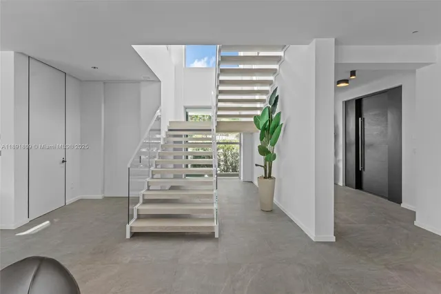 a bathroom with a sink and mirror