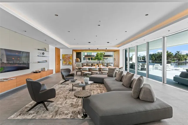 a kitchen with stainless steel appliances granite countertop a sink and cabinets