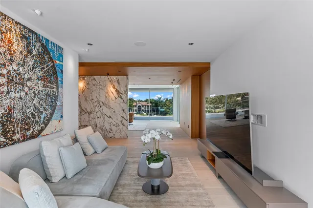 an aerial view of a house with swimming pool garden view and lake view