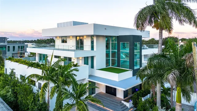 a living room with furniture gym equipment and a large window