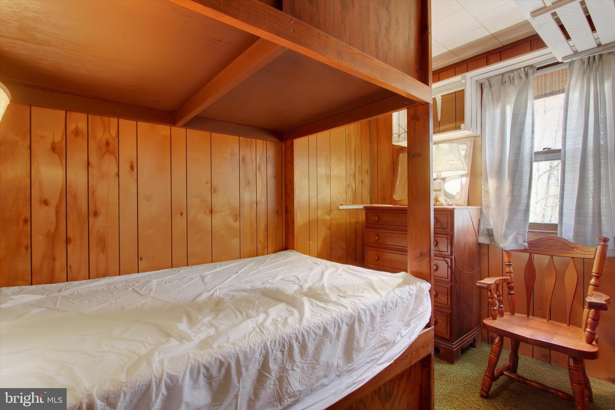 50 Boyds Schoolhouse Road Biglerville, PA 17307 - Photo 12 of 26 a bed sitting in a spacious bedroom next to a window