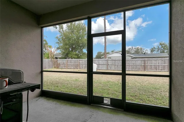 a view of a city from a room