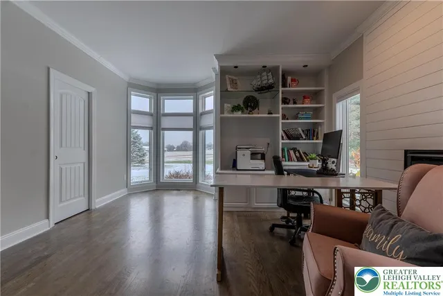 a large kitchen with lots of counter space and a refrigerator