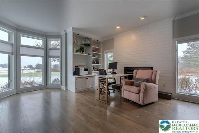 a view of a hallway with windows