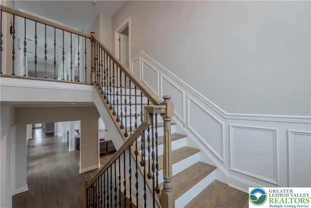 a view of a patio with furniture and a yard