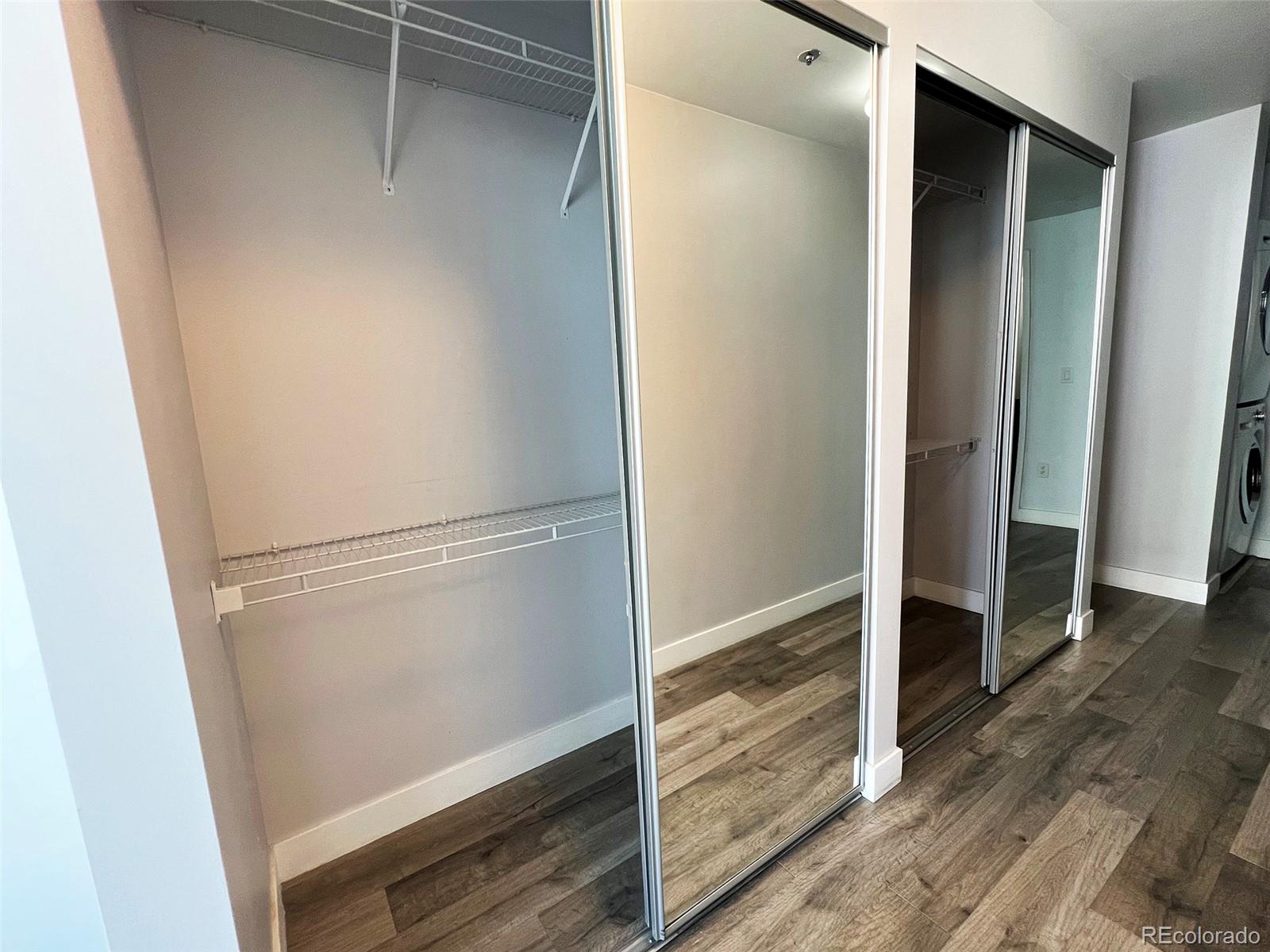 891 14th Street, Unit 1614 Denver, CO 80202 - Photo 21 of 49 a view of walk in closet with wooden floor