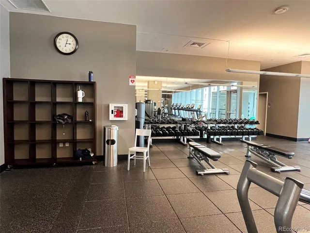 a swimming pool on roof with city view
