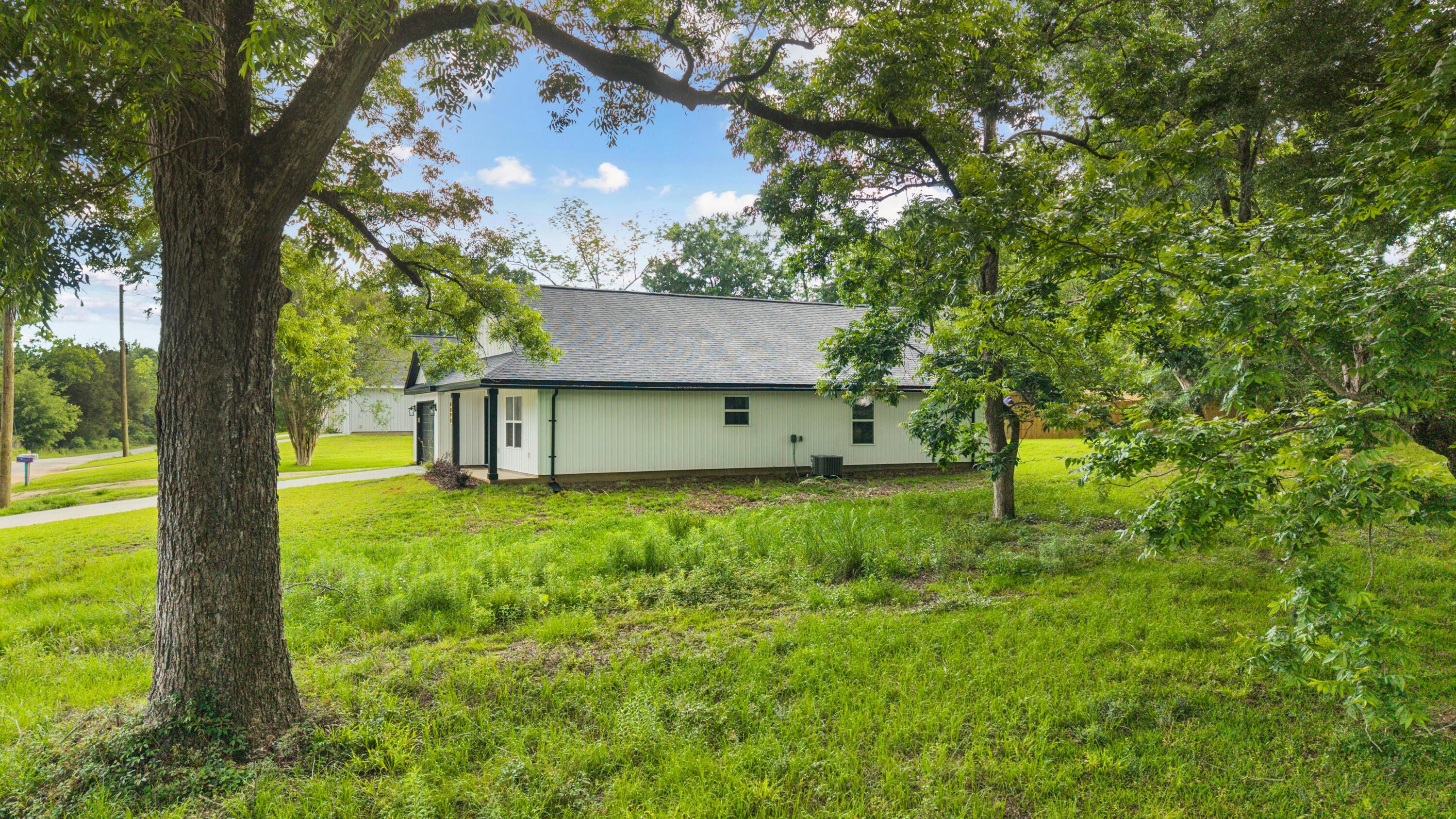 8090 3rd Street Laurel Hill, FL 32567 - Photo 31 of 34 Yard Borders Small Pecan Orchard!