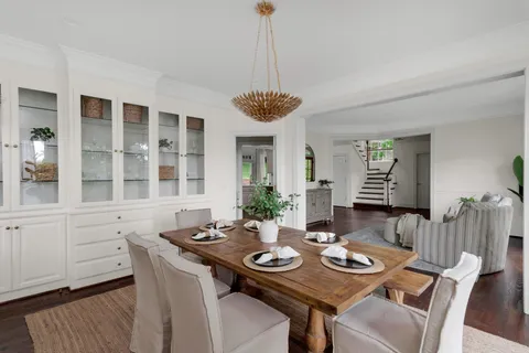 a view of a livingroom with furniture and a kitchen