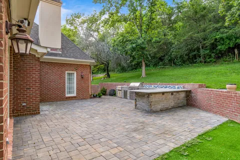a view of a street with a tree in the background