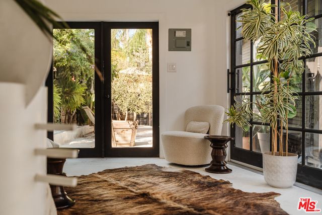 a living room with a couch and a table