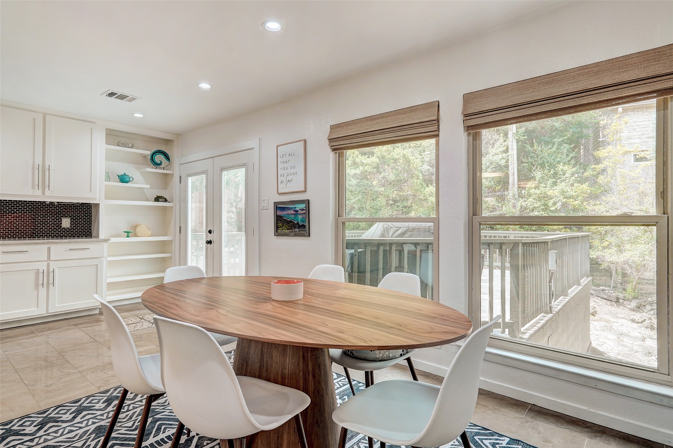 8804 Mountain Ridge Drive, Unit A Austin, TX 78759 - Photo 16 of 37 Dining room featuring french doors and recessed lighting