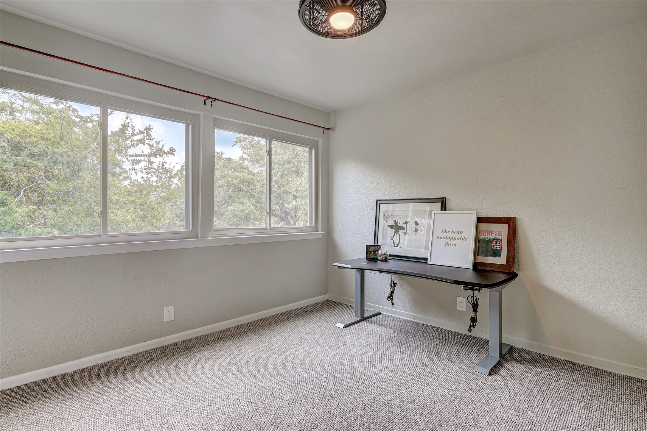 8804 Mountain Ridge Drive, Unit A Austin, TX 78759 - Photo 29 of 37 Office space with light colored carpet and a textured wall