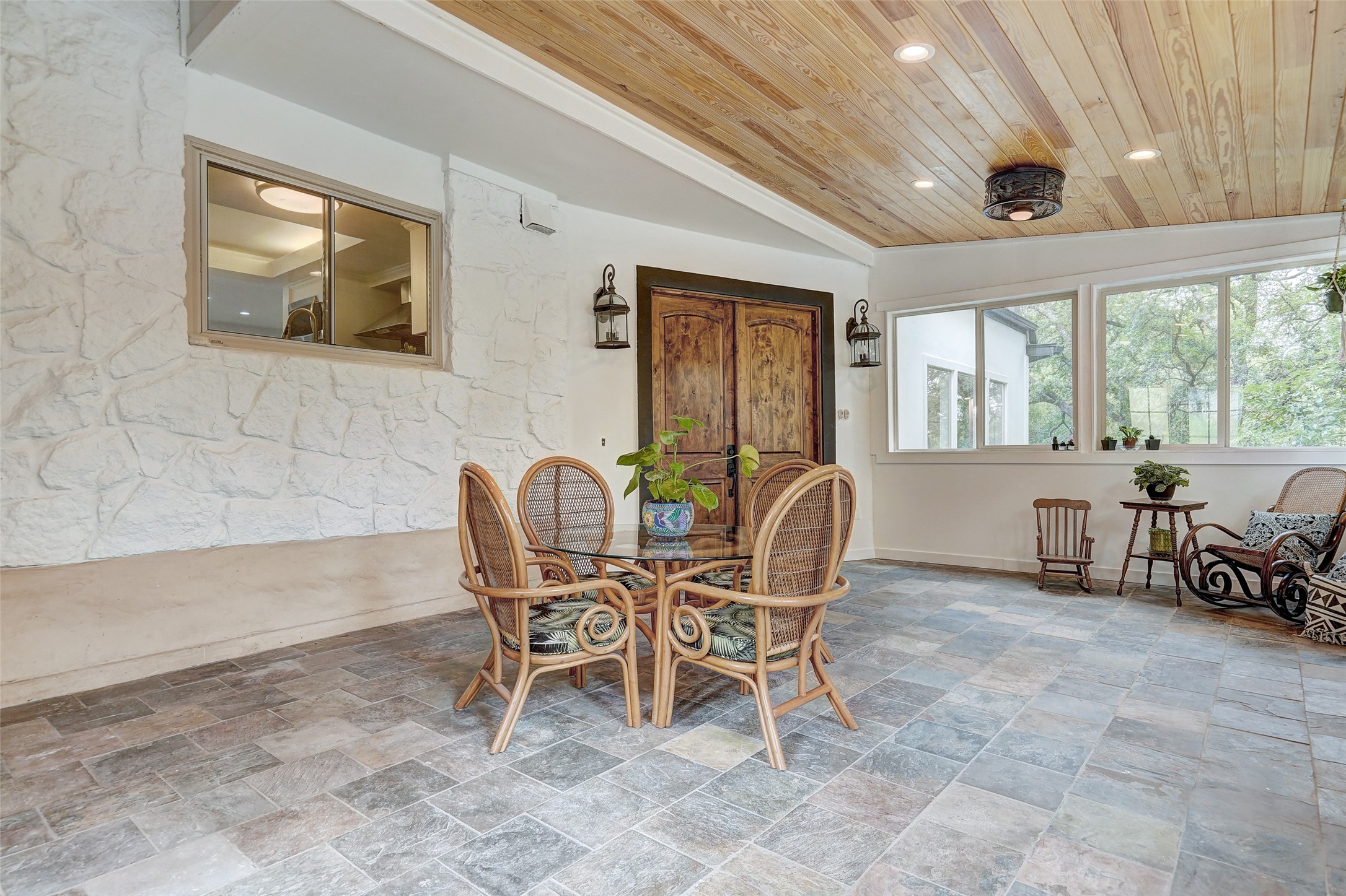 8804 Mountain Ridge Drive, Unit A Austin, TX 78759 - Photo 6 of 37 Dining space with stone finish flooring, wood ceiling, and recessed lighting