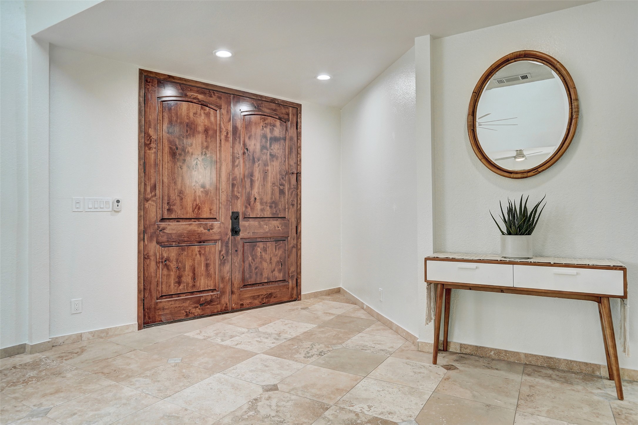 8804 Mountain Ridge Drive, Unit A Austin, TX 78759 - Photo 7 of 37 Foyer entrance with baseboards and recessed lighting