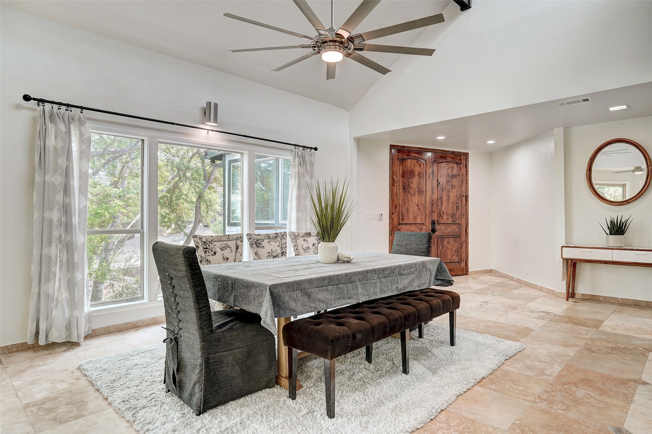 8804 Mountain Ridge Drive, Unit A Austin, TX 78759 - Photo 8 of 37 Dining space with lofted ceiling, ceiling fan, and recessed lighting