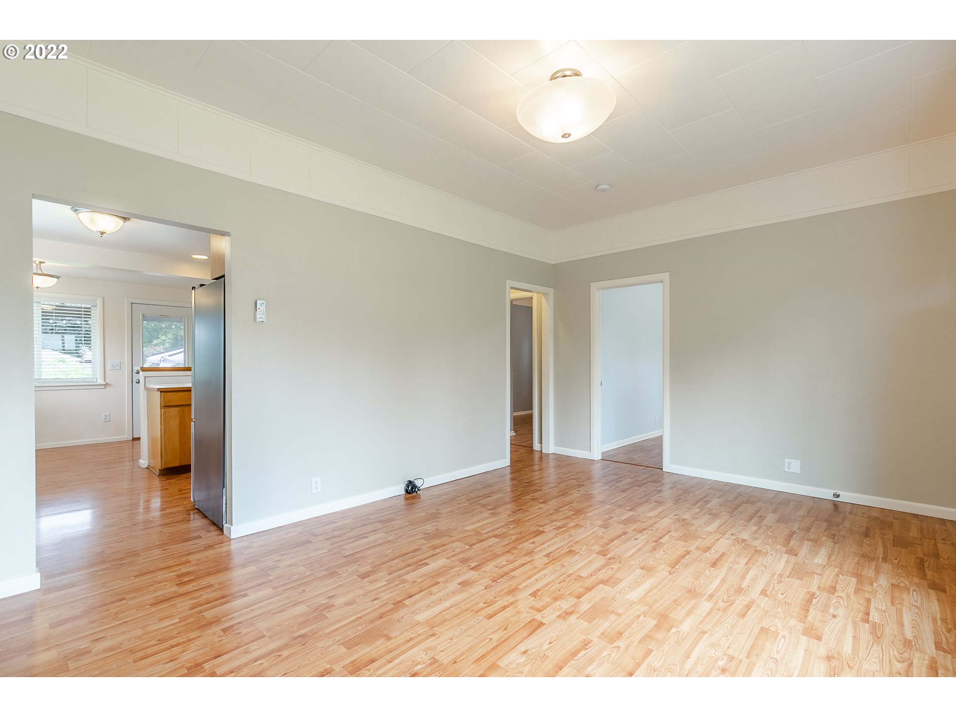476 U Street Springfield, OR 97477 - Photo 8 of 32 a view of an empty room and wooden floor