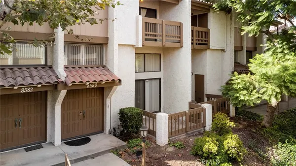 a yellow house with outdoor space
