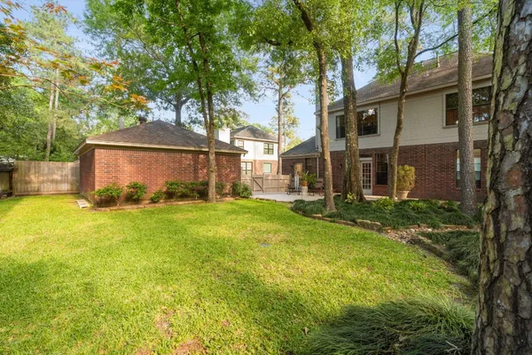 $595,000 | 34 Plum Blossom Place, The Woodlands, TX 77381