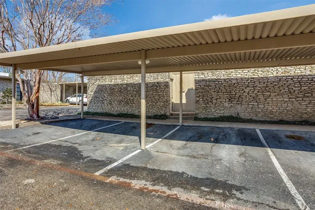 a view of a backyard with a patio