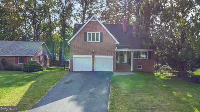 a picture of a bathroom with a sink and a mirror