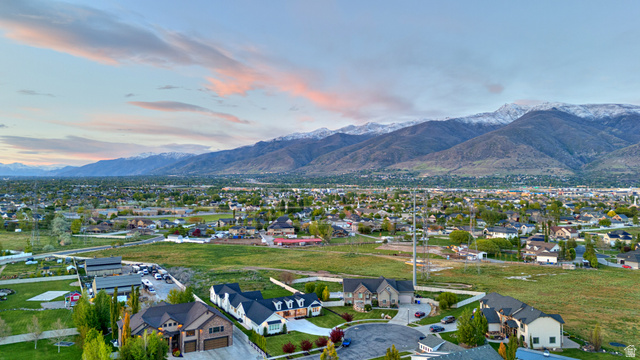 1952 South Comanche Circle Farmington, UT 84025 - Photo 49 of 52 Aerial view of residential area with a mountain backdrop