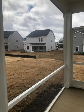 a view of swimming pool from a balcony