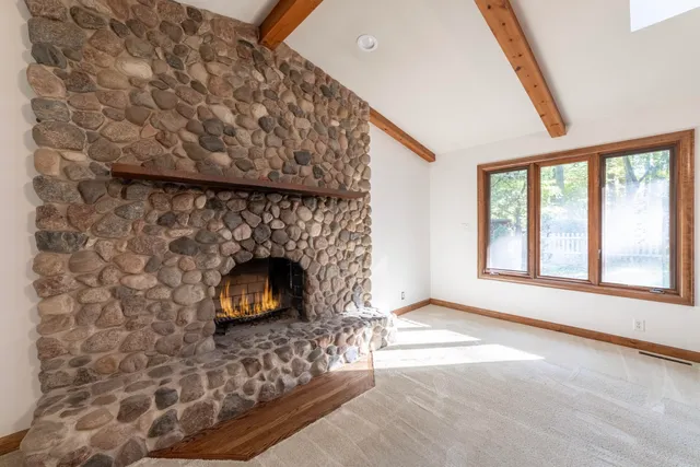 a living room with a fireplace