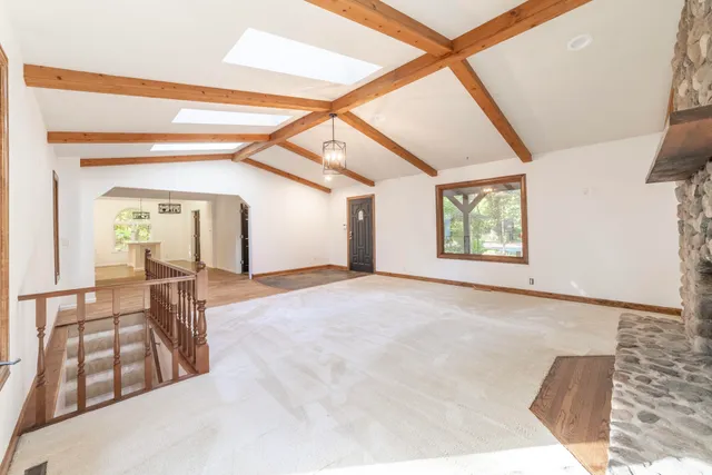 a view of livingroom with furniture and fireplace