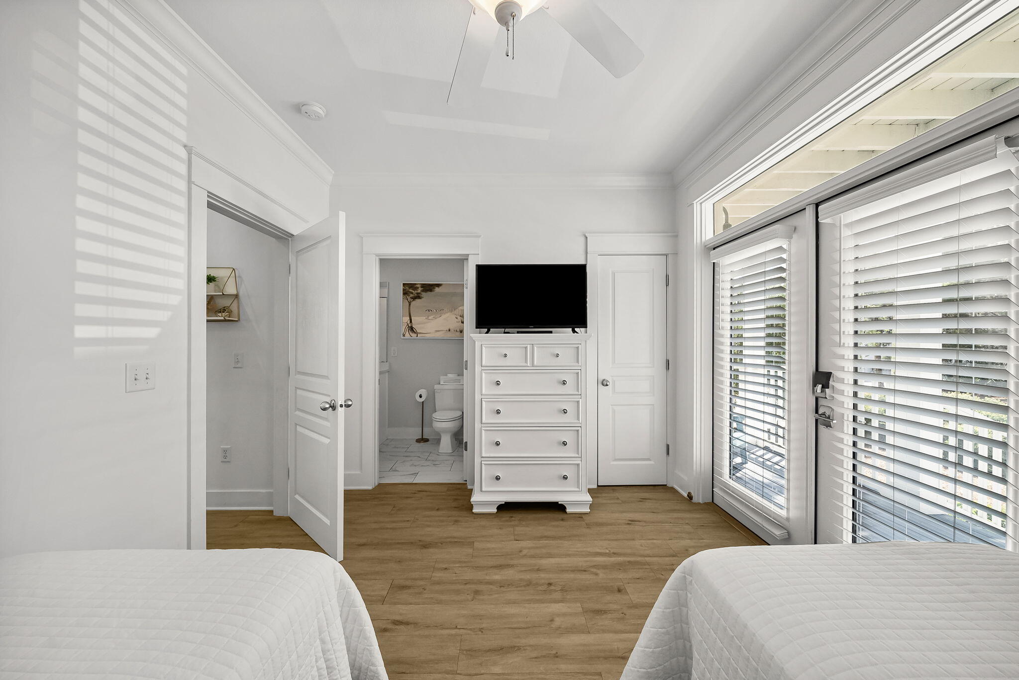 22 Moonlight Beach Lane Inlet Beach, FL 32461 - Photo 12 of 70 a bedroom with a bed and flat screen tv