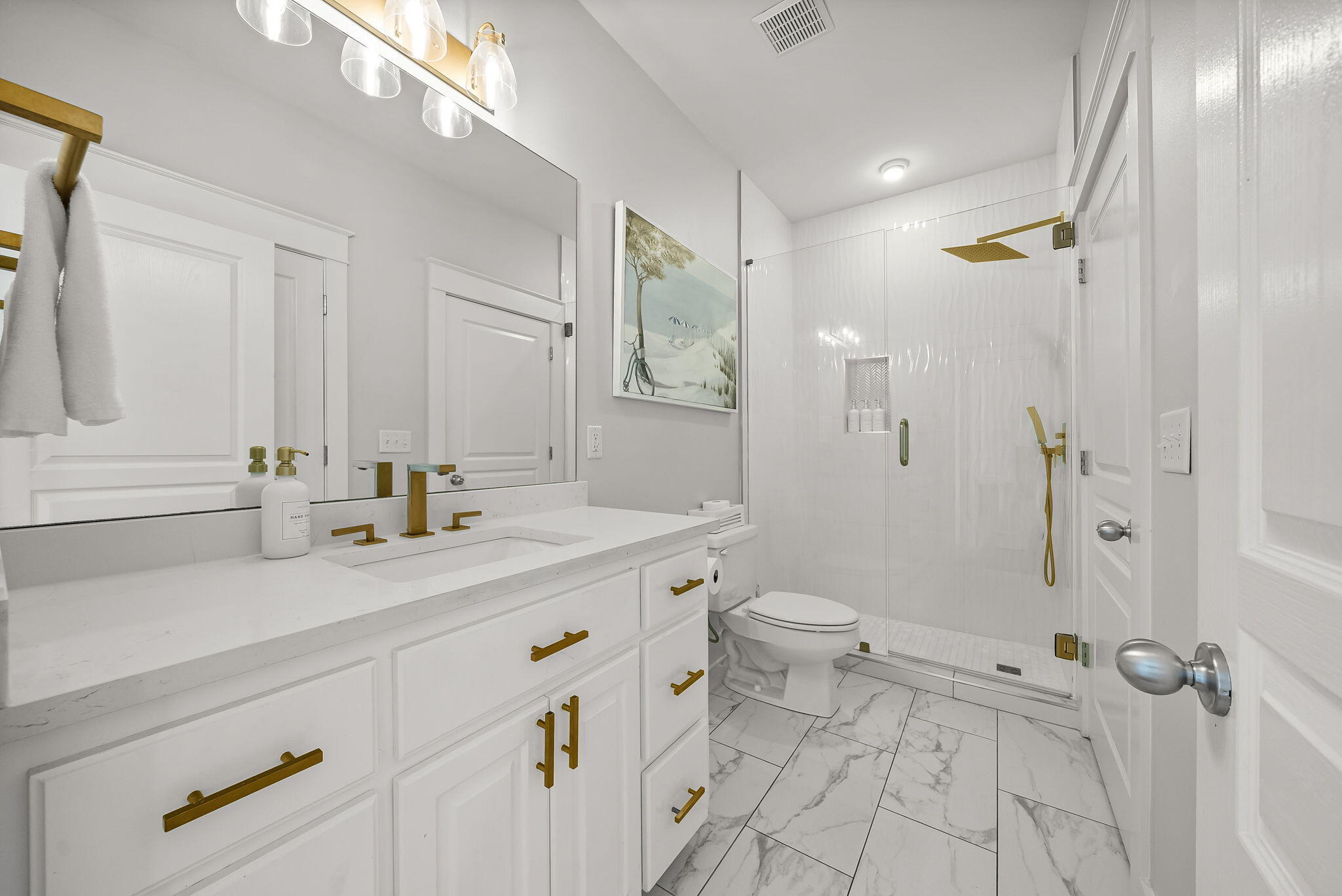 22 Moonlight Beach Lane Inlet Beach, FL 32461 - Photo 13 of 70 a bathroom with a double vanity sink toilet and shower