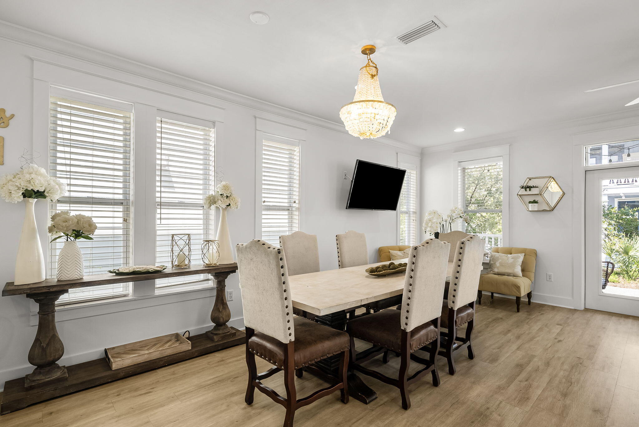 22 Moonlight Beach Lane Inlet Beach, FL 32461 - Photo 19 of 70 a view of a dining room with furniture window and wooden floor