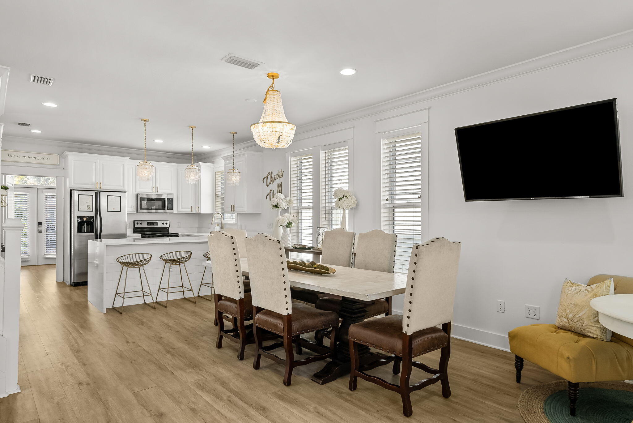 22 Moonlight Beach Lane Inlet Beach, FL 32461 - Photo 20 of 70 a view of a dining room with furniture and wooden floor
