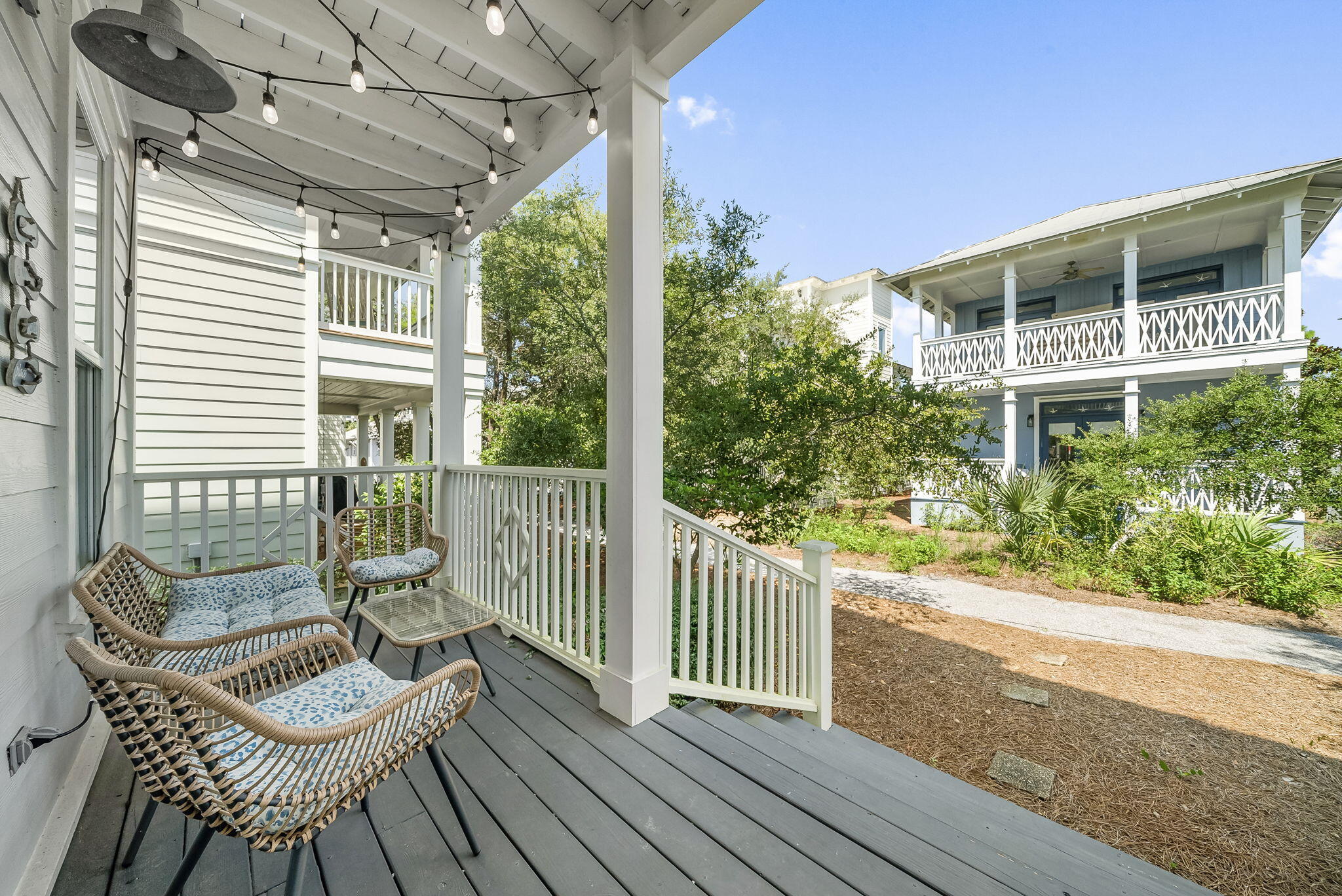 22 Moonlight Beach Lane Inlet Beach, FL 32461 - Photo 24 of 70 a balcony with wooden floor and outdoor space