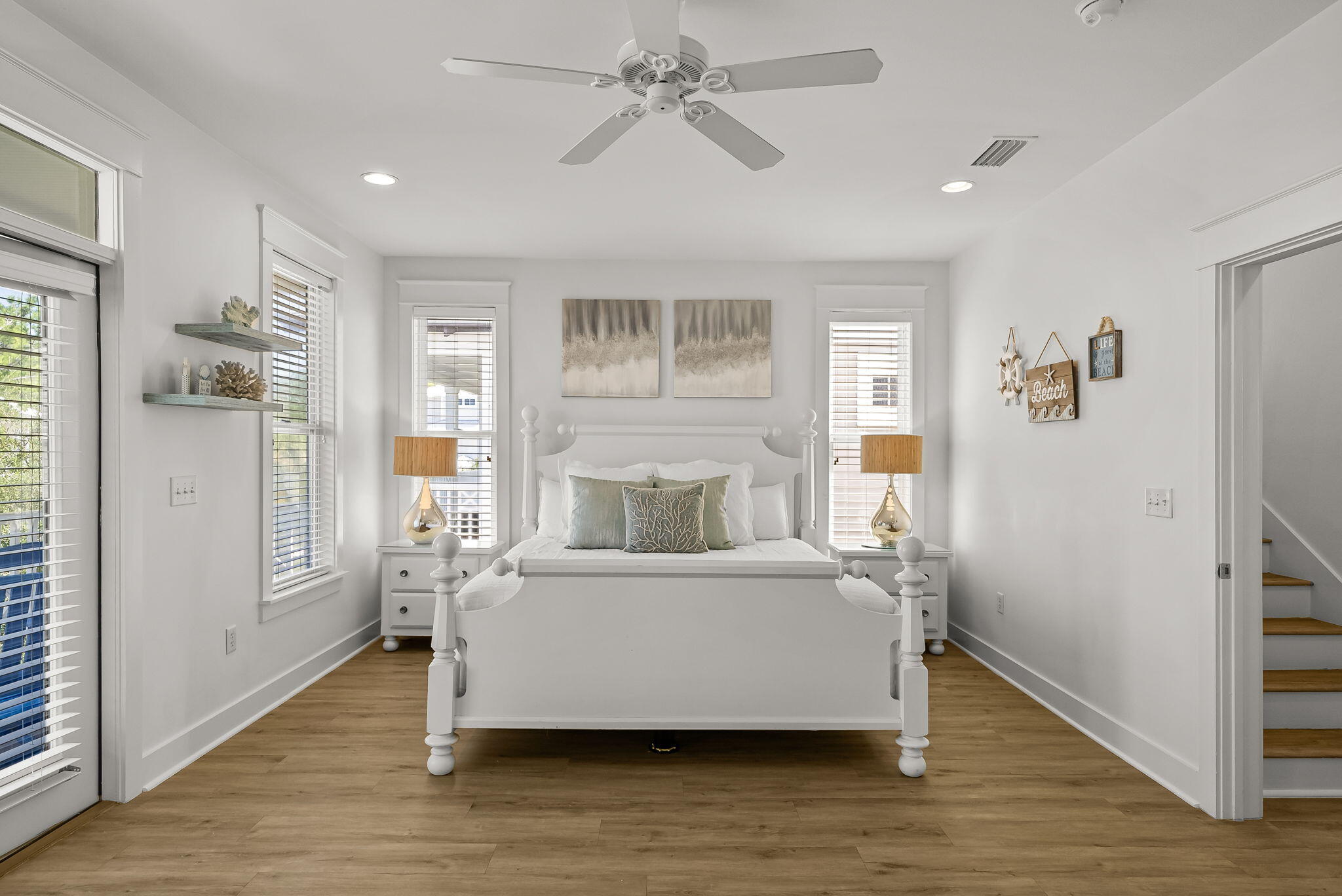22 Moonlight Beach Lane Inlet Beach, FL 32461 - Photo 28 of 70 a living room with a bed and wooden floor