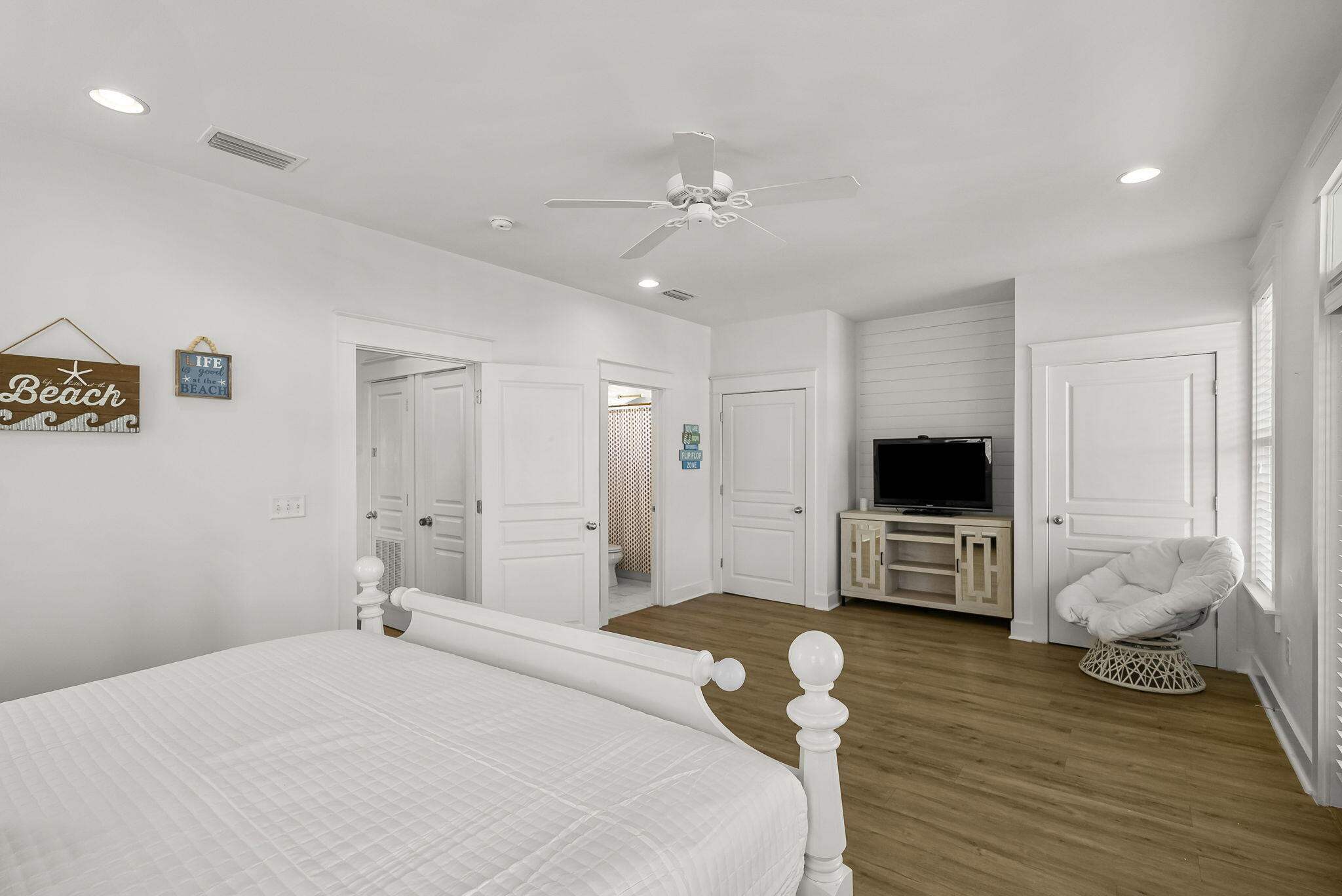 22 Moonlight Beach Lane Inlet Beach, FL 32461 - Photo 30 of 70 a bedroom with a bed and a flat screen tv