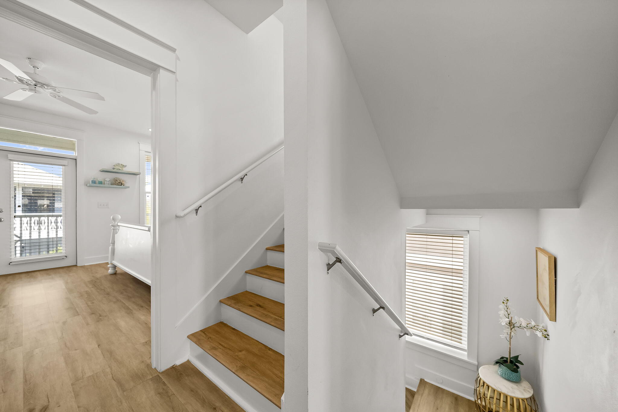 22 Moonlight Beach Lane Inlet Beach, FL 32461 - Photo 42 of 70 a view of an entryway with wooden floor and stairs