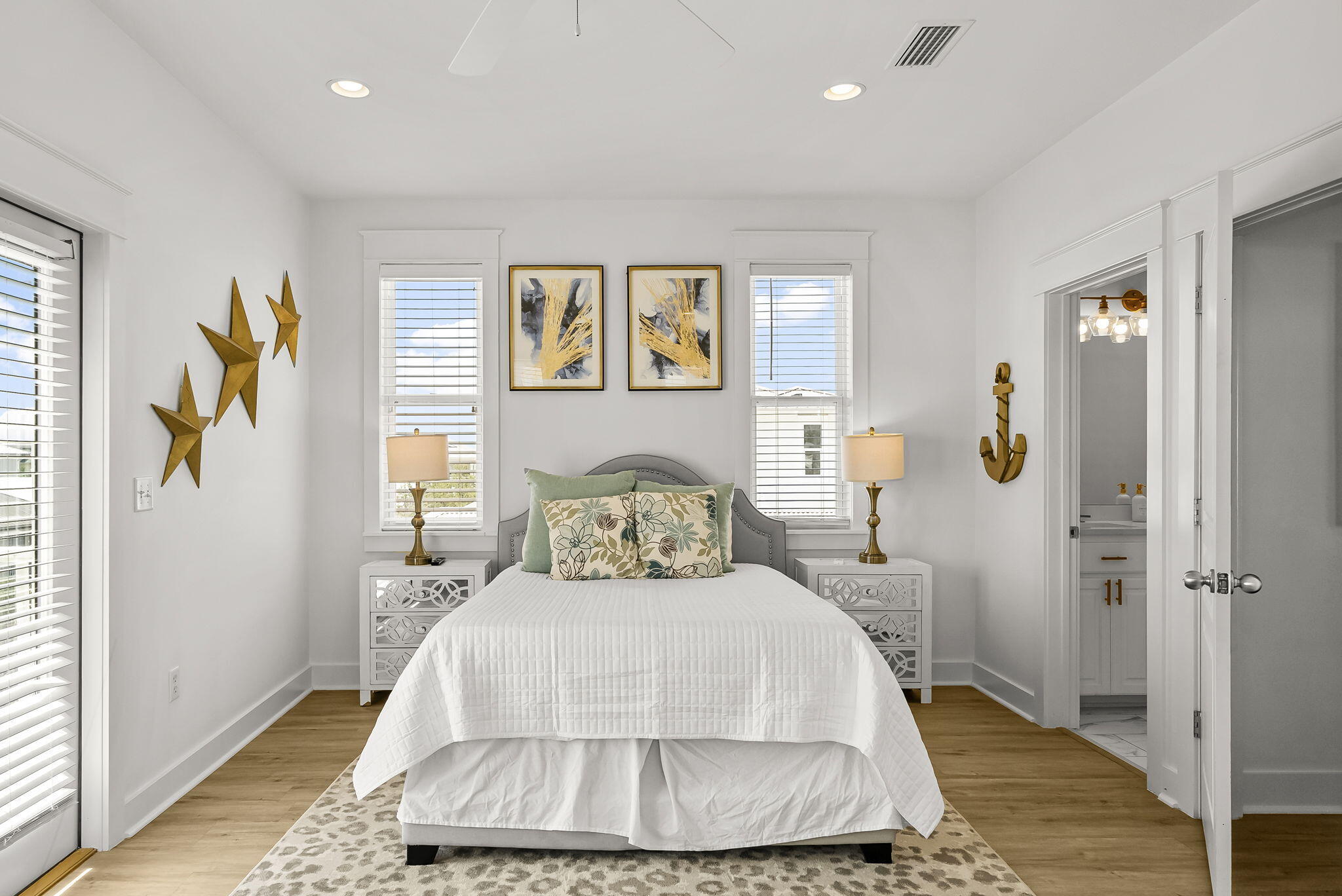 22 Moonlight Beach Lane Inlet Beach, FL 32461 - Photo 43 of 70 a bedroom with a bed and wooden floor