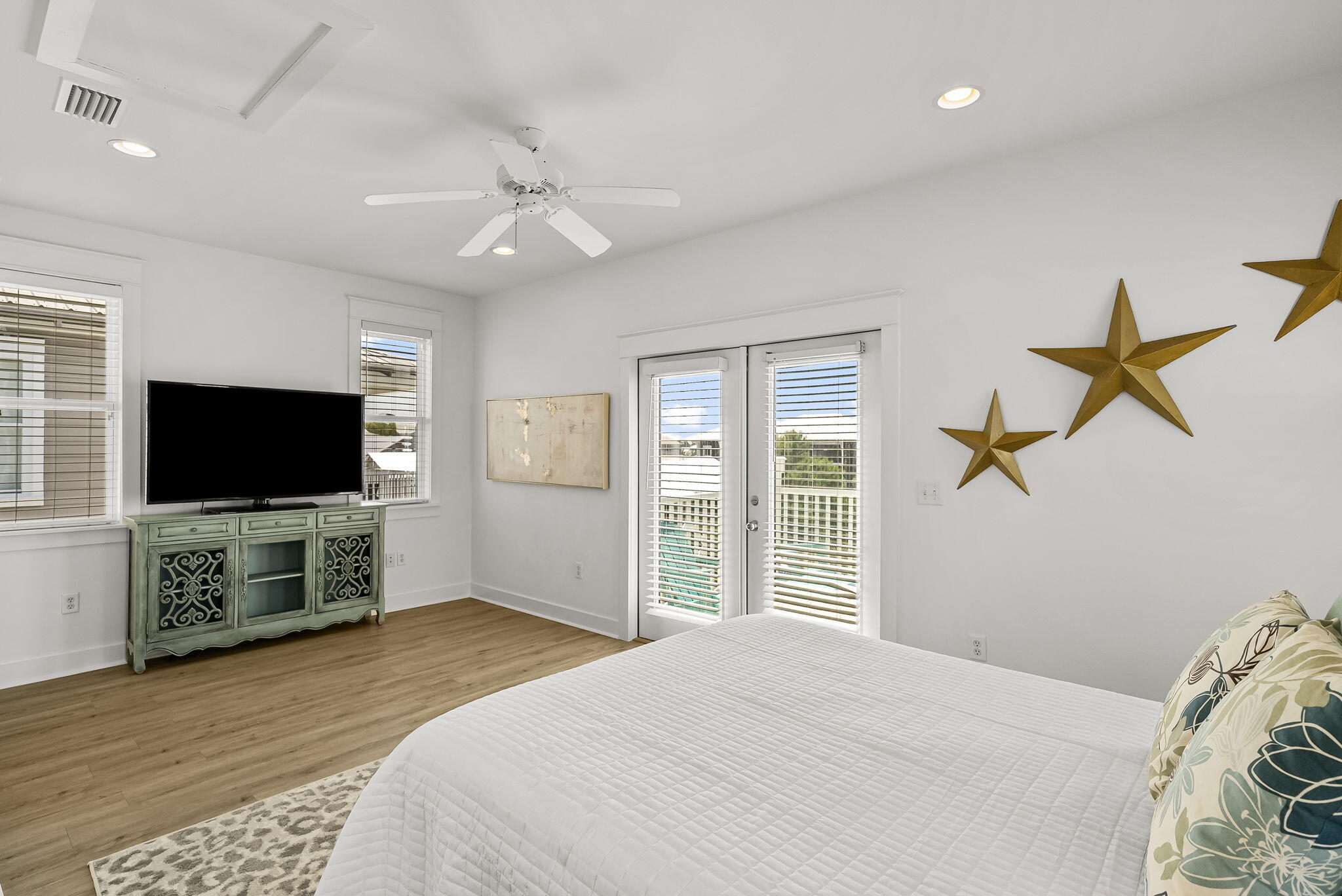 22 Moonlight Beach Lane Inlet Beach, FL 32461 - Photo 44 of 70 a bedroom with a bed and a flat screen tv