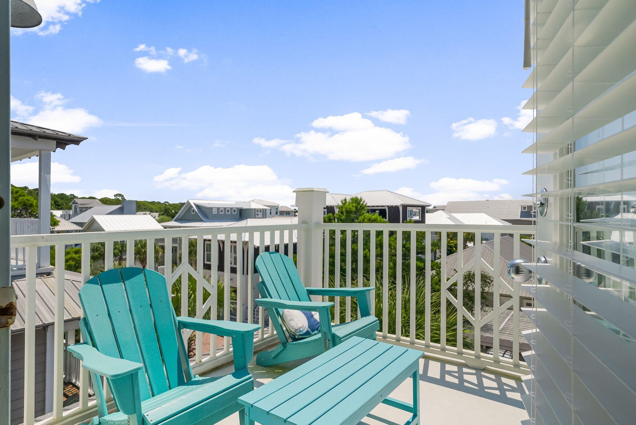 22 Moonlight Beach Lane Inlet Beach, FL 32461 - Photo 47 of 70 a view of a balcony with wooden chairs