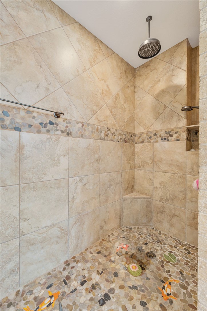 7754 Edge Cut Off Road Hearne, TX 77859 - Photo 17 of 49 Bathroom view of a tile shower
