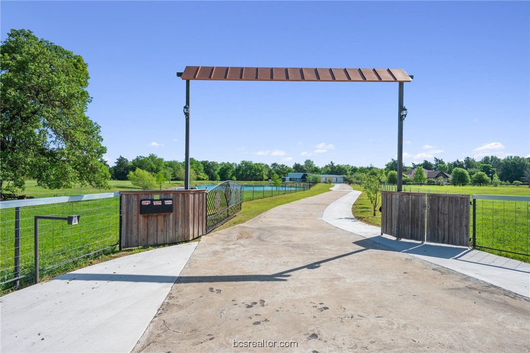 7754 Edge Cut Off Road Hearne, TX 77859 - Photo 26 of 49 a view of a swimming pool with a yard
