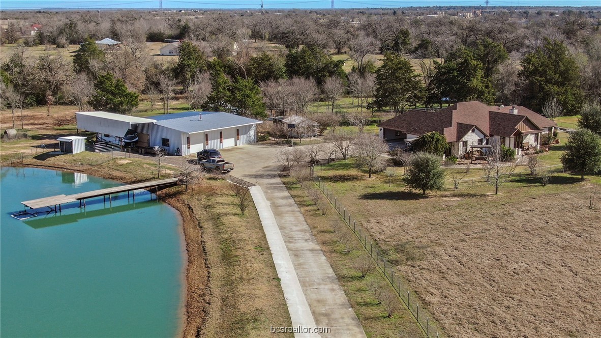 7754 Edge Cut Off Road Hearne, TX 77859 - Photo 47 of 49 an aerial view of a house with a yard basket ball court and outdoor seating