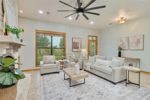a kitchen with a stove a sink and a refrigerator