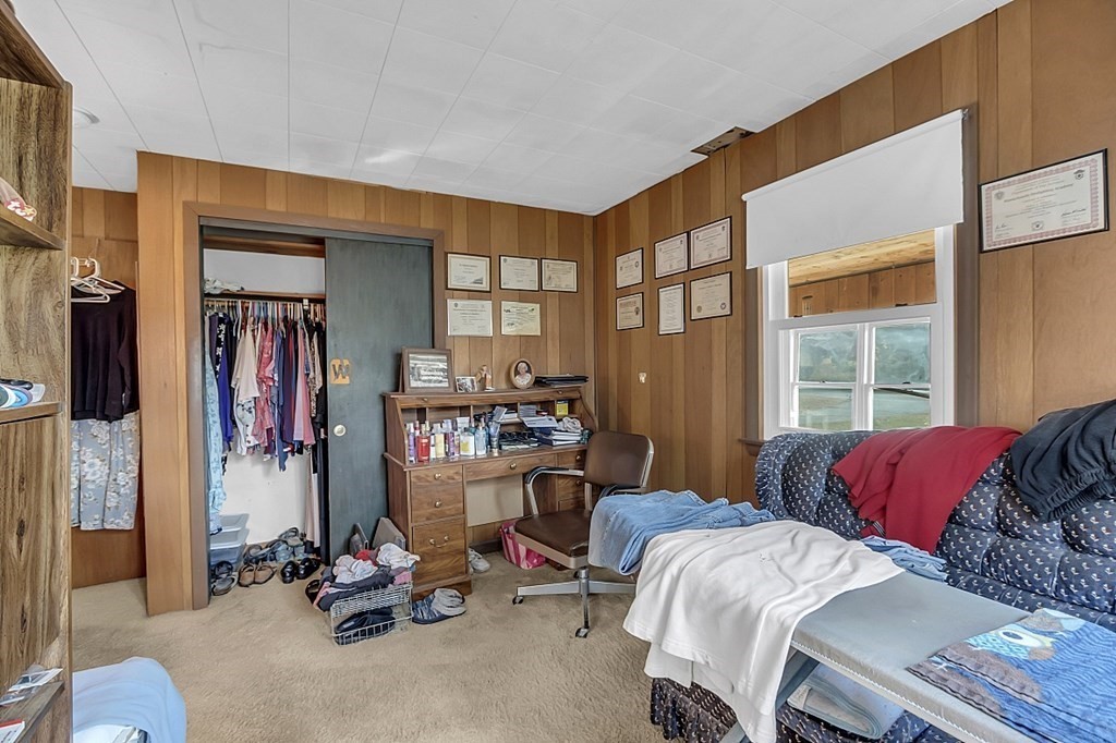 320 Bolton Road Lancaster, MA 01523 - Photo 15 of 28 a bedroom with a bed and a window