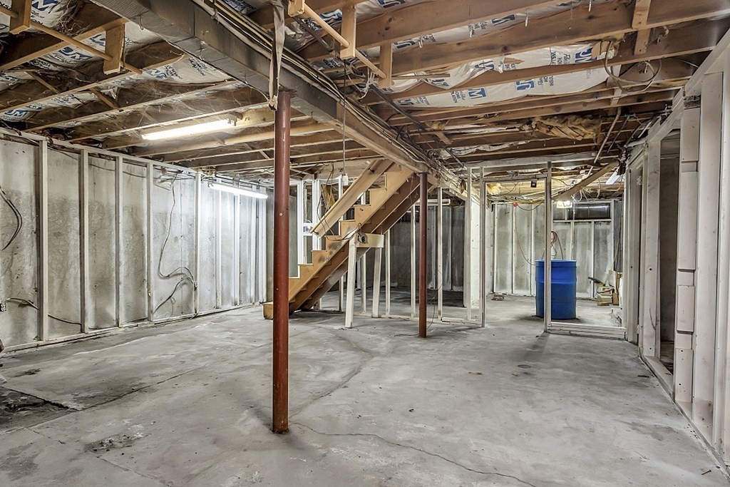 320 Bolton Road Lancaster, MA 01523 - Photo 24 of 28 a view of an empty room with wooden walls
