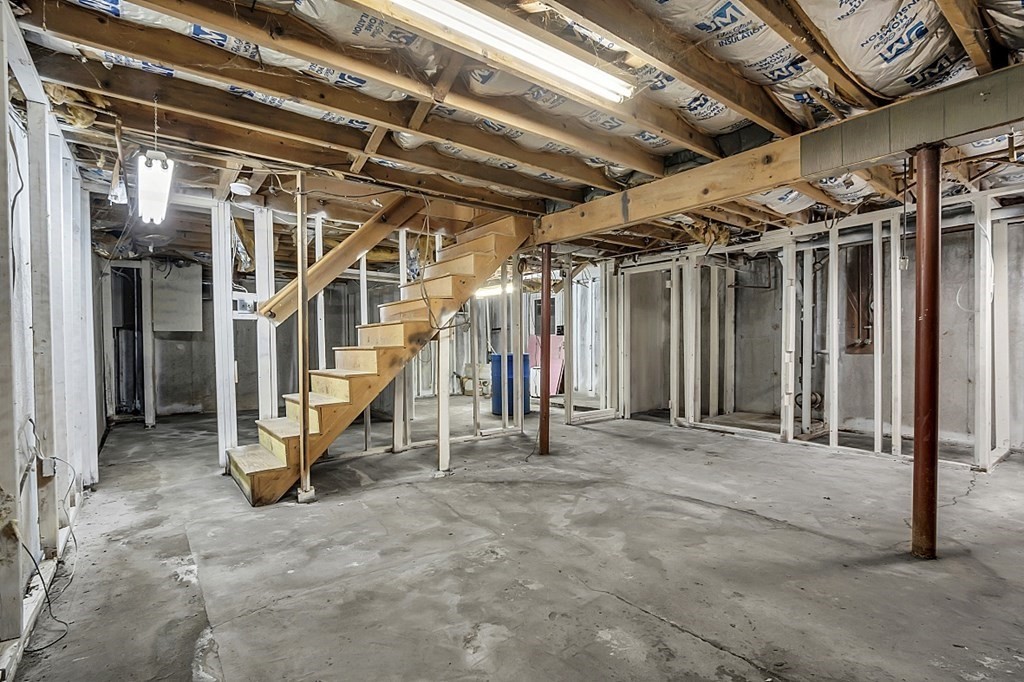 320 Bolton Road Lancaster, MA 01523 - Photo 25 of 28 a view of an empty room with wooden walls