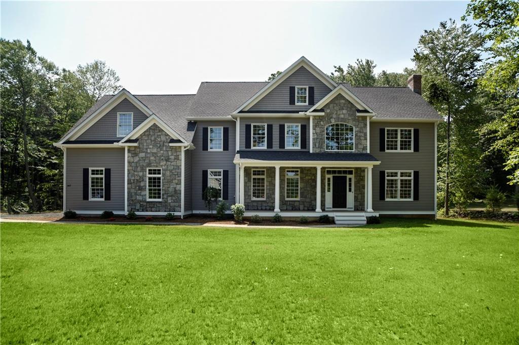 147 Pine Grove Road Guilford, CT 06437 - Photo 1 of 1 a front view of a house with a garden